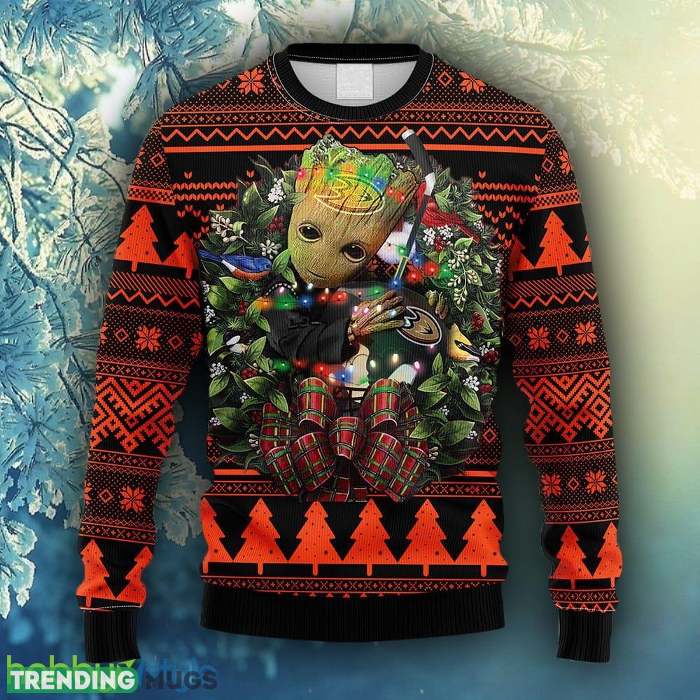NHL Logo Anaheim Ducks Groot Hug Christmas Ugly Sweater For Men Women - NHL Anaheim Ducks Groot Hug Christmas Ugly Sweater_1 NHL Logo Anaheim Ducks Groot Hug Christmas Ugly Sweater For Men Women - NHL Anaheim Ducks Groot Hug Christmas Ugly Sweater_1
