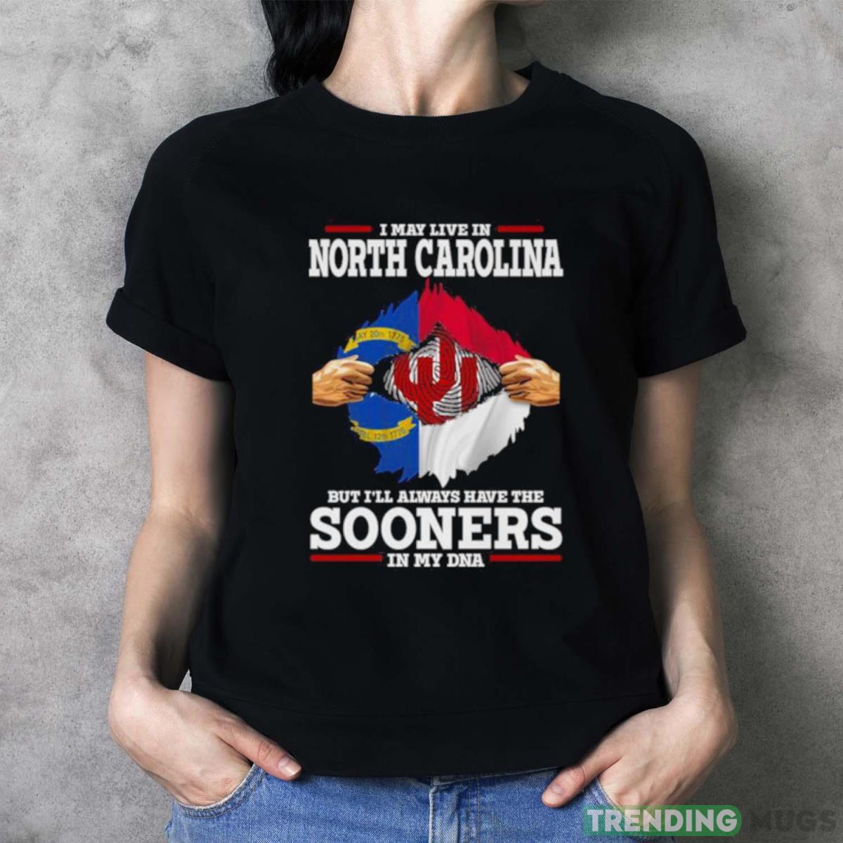 I May Live In North Carolina But I’ll Always Have The Oklahoma Sooners In My DNA 2023 shirt Dark Shirt I May Live In North Carolina But I’ll Always Have The Oklahoma Sooners In My DNA 2023 shirt Dark Shirt